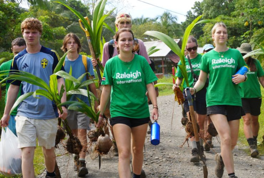 Group of Raleigh Venturers carrying plants for regeneration project