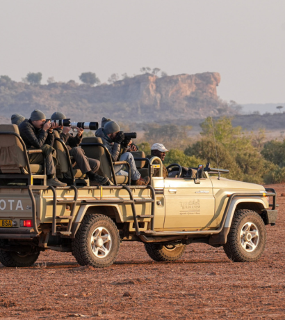 Photographers on Game Vehicle in Botswana on a Penda Photo Tour
