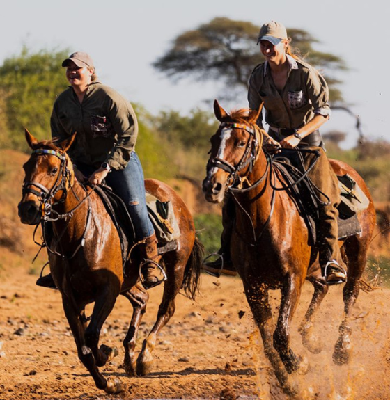 Two riders on horseback on an African Horse Safaris adventure
