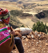 Reflections and Flute playing in Peru overlooking the Moray archaeological site