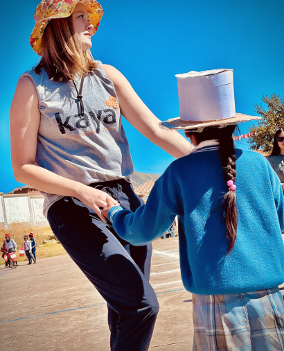 Student and community member in Peru dancing