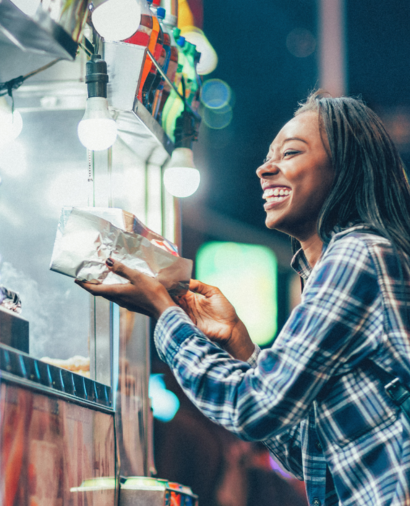 Student on a StudyAbroad programme sampling local cuisine at night market