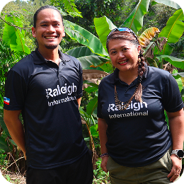 Meet our people behind the Impact Travel Group: Two of the Borneo team wearing Raleigh t-shirts