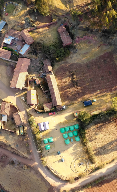 Aerial photo of one of Camps International bases in Peru called Camp Moray - show tented accommodation and communal social areas
