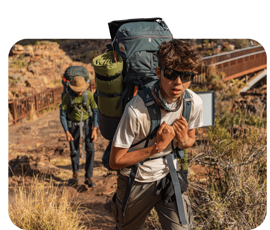 Young adult hiking on an Impact Travel Group expedition